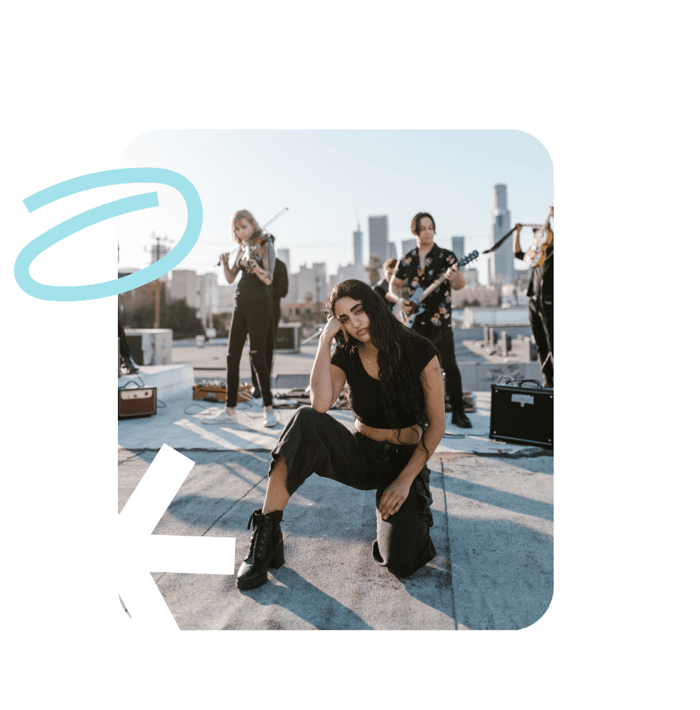Band playing together on a rooftop